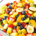 close up of fruit salad in clear bowl