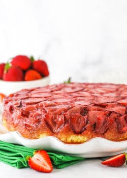 Strawberry upside down cake on a serving platter