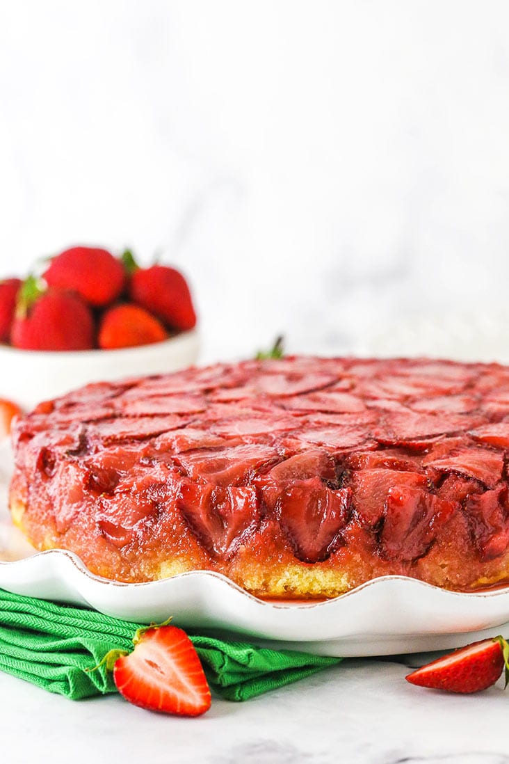 Strawberry upside down cake on a serving platter