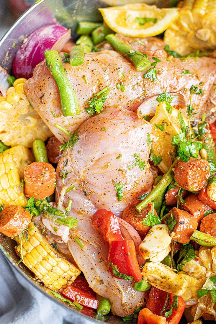 raw ingredients mixed together in large metal bowl