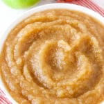 A white bowl of homemade applesauce