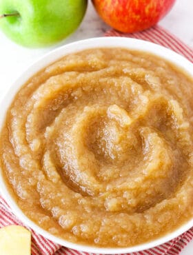 A white bowl of homemade applesauce