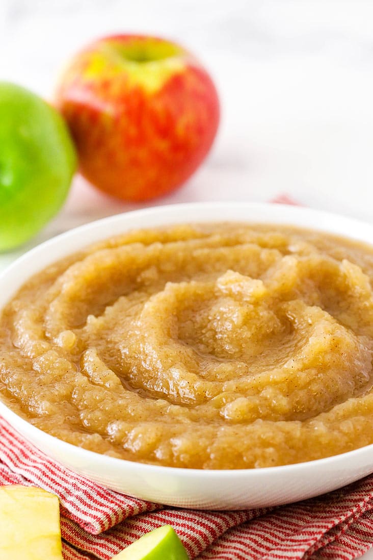 A white bowl of instant pot applesauce