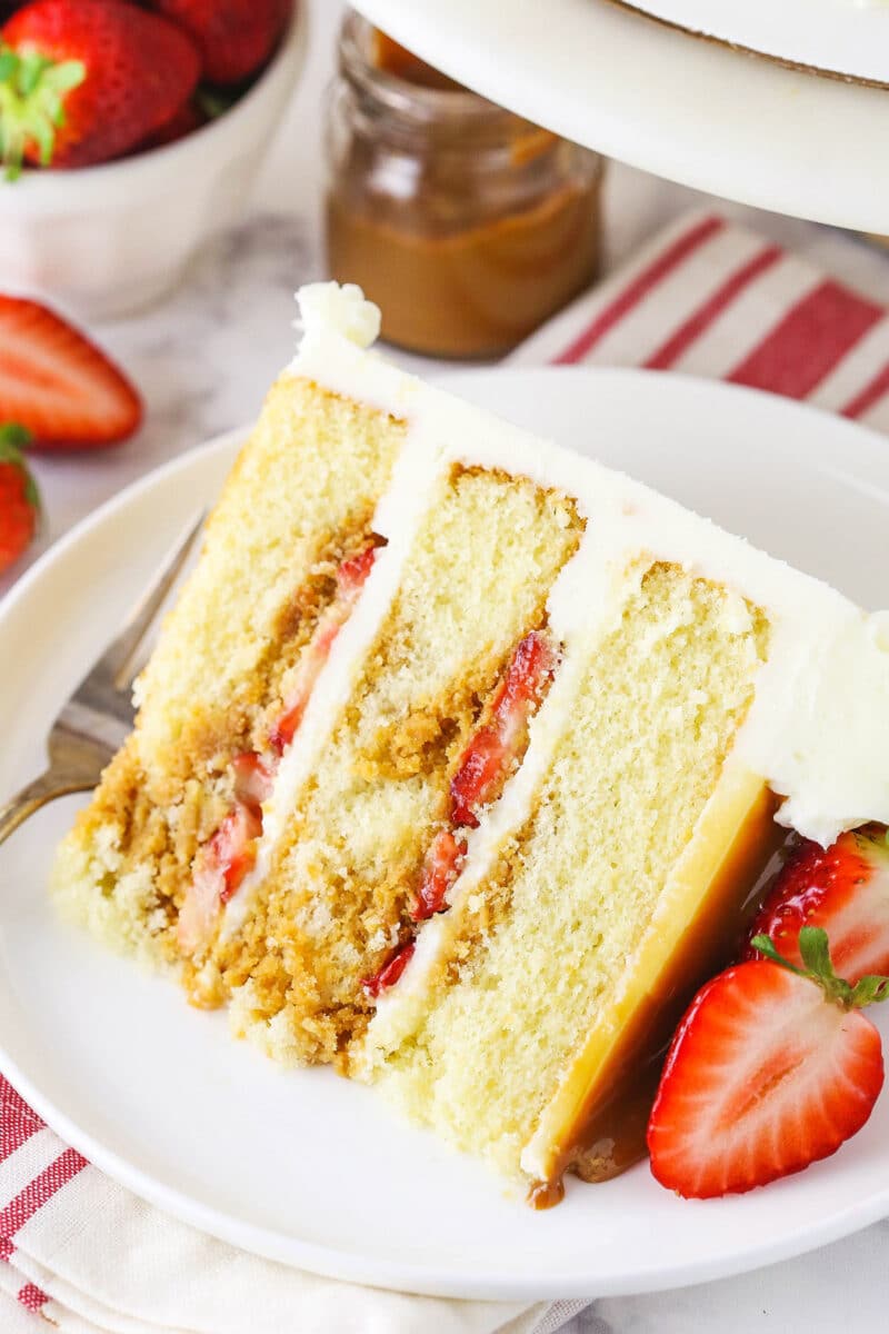 slice of Strawberry Dulce De Leche Cake on white plate