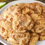 pile of apple snickerdoodles on grey plate on wood surface