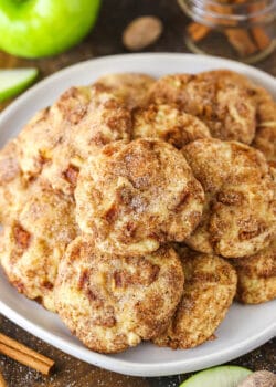 pile of apple snickerdoodles on grey plate on wood surface