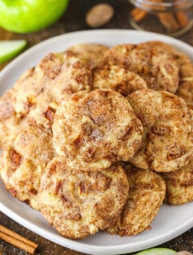 pile of apple snickerdoodles on grey plate on wood surface