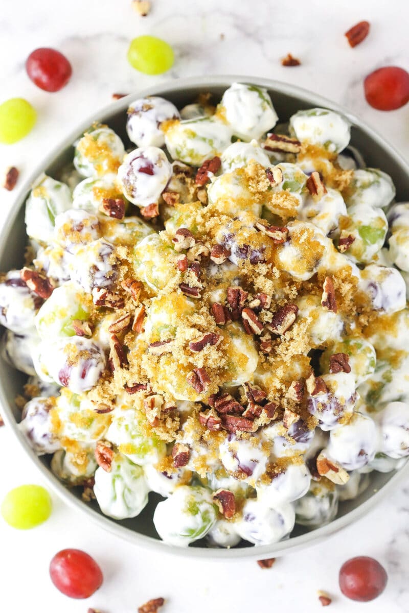 grape salad in grey bowl on marble background