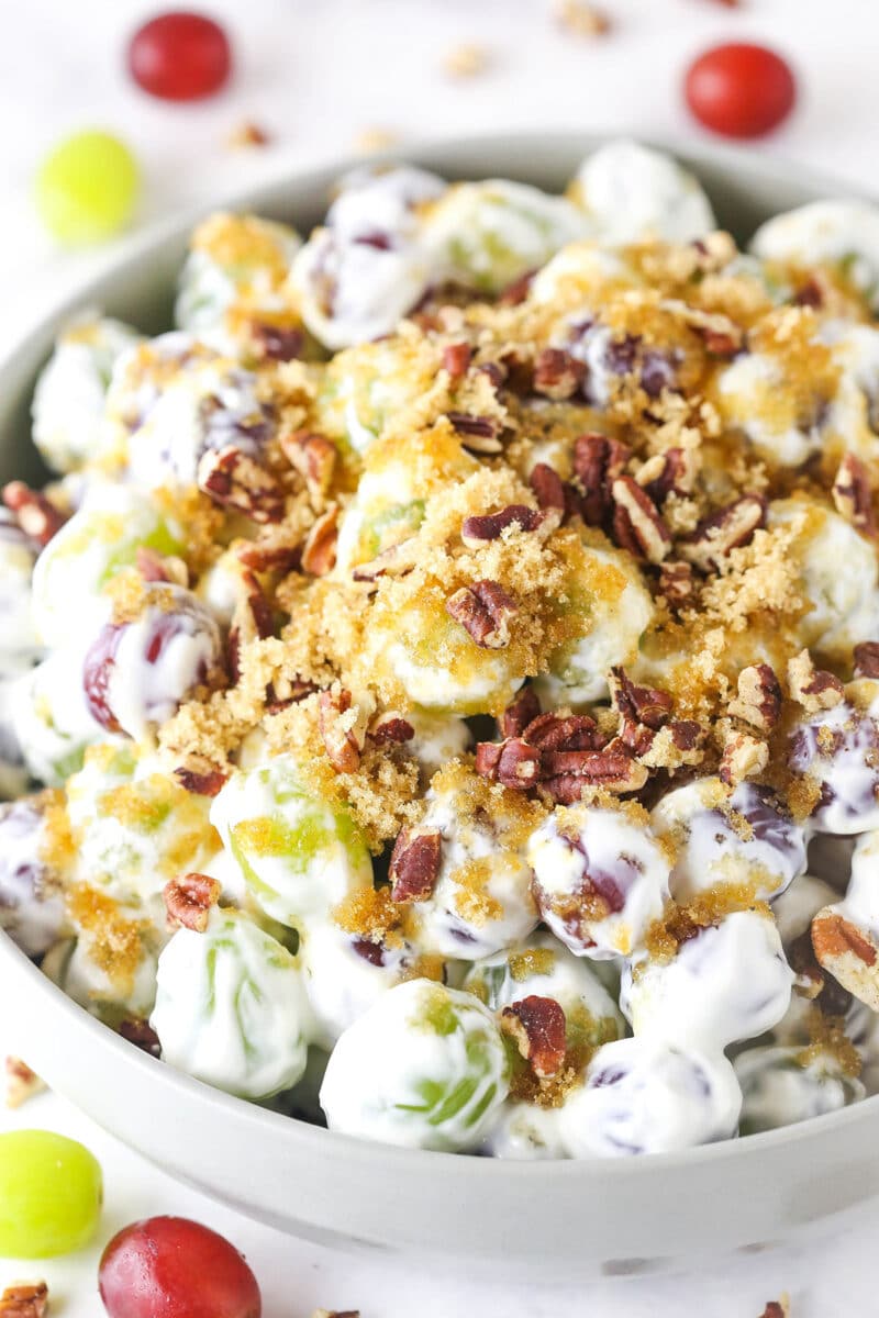 grape salad with brown sugar and pecans on top