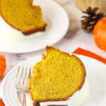 pumpkin pound cake slice on white plate with orange napkin