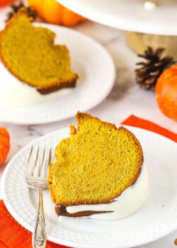 pumpkin pound cake slice on white plate with orange napkin