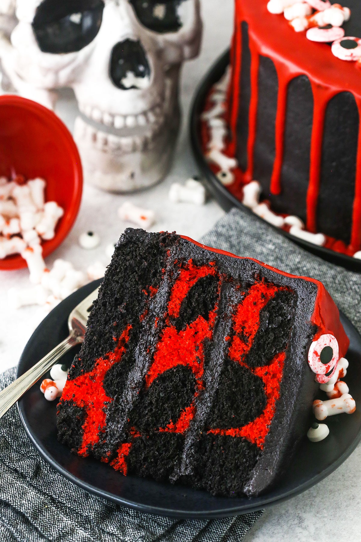 red and black marble halloween cake with black chocolate buttercream