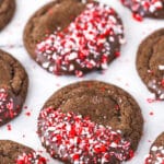 Neatly arranged peppermint chocolate sugar cookies on a marble countertop