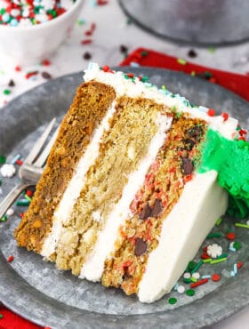 Christmas Cookie Layer Cake slice on metal plate