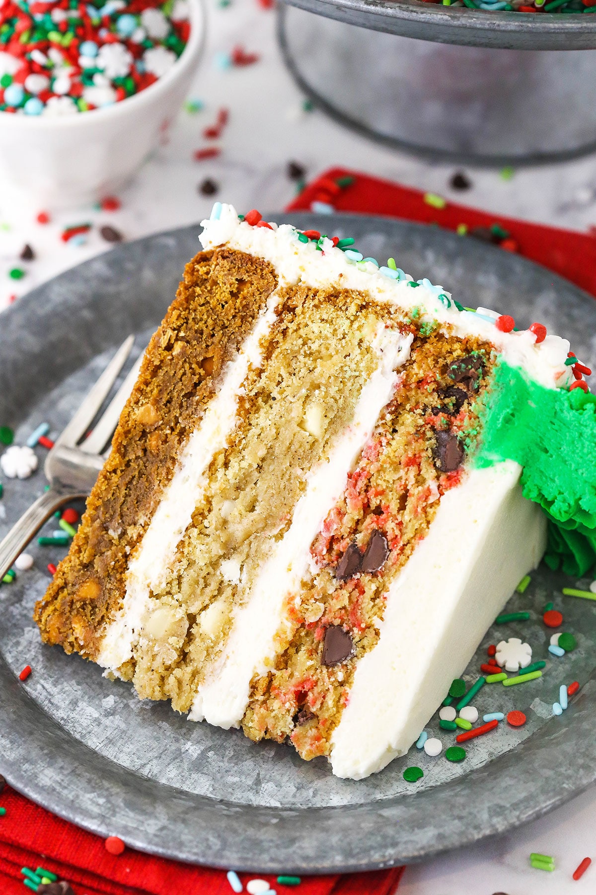 Christmas Cookie Layer Cake slice on metal plate