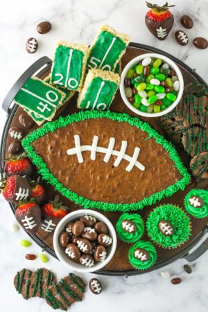 Football Dessert Board with green, brown and white treats