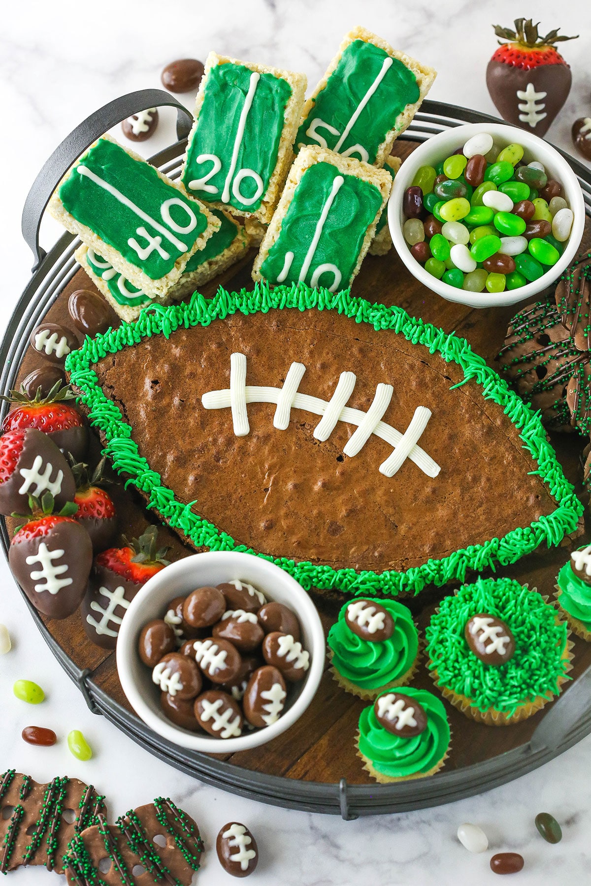 football dessert board with football themed treats