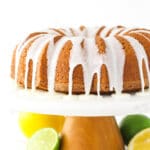 A lemon-lime bundt cake with homemade glaze dripping down the sides