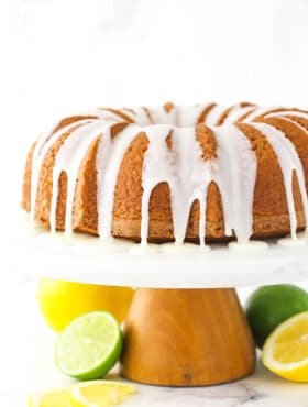 A lemon-lime bundt cake with homemade glaze dripping down the sides