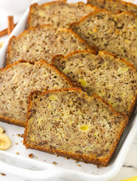 Seven pieces of pineapple banana bread inside of a large casserole dish