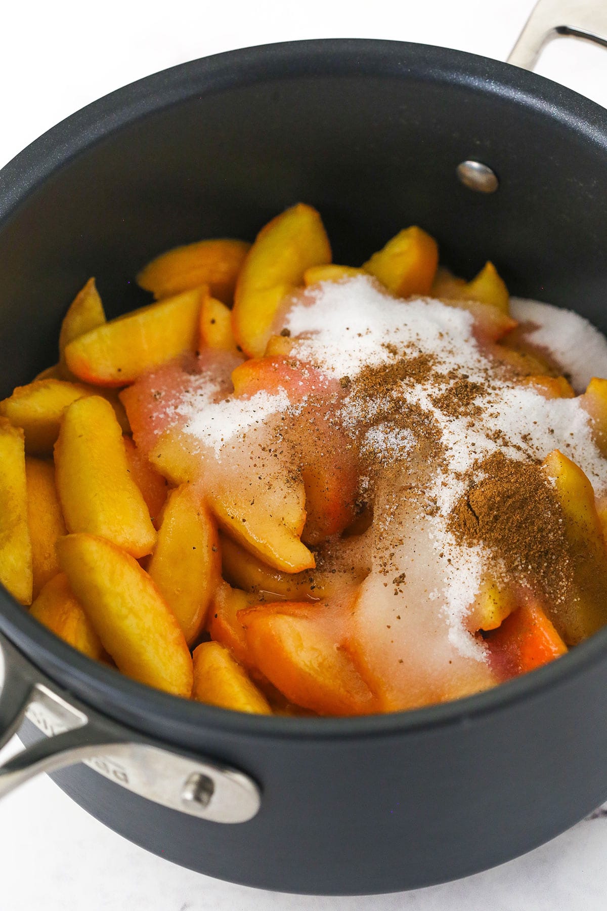 ingredients for peach filling all in a saucepan
