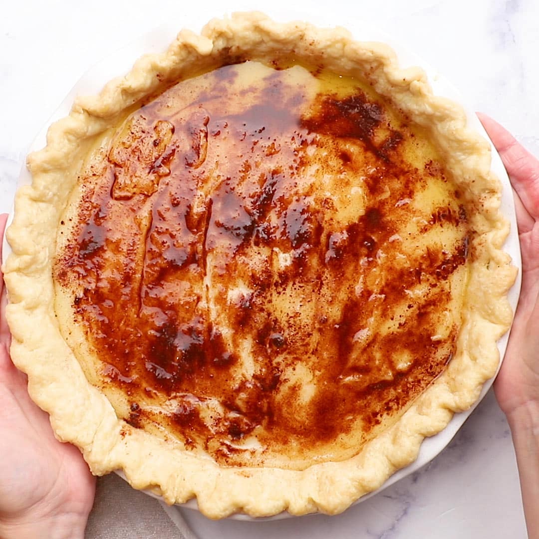 the prepped pie with the cinnamon and nutmeg topping on top, ready to go in the oven