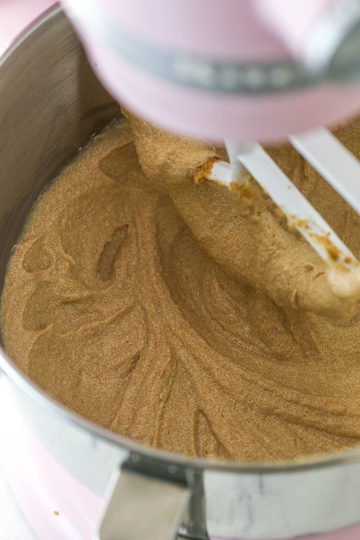 butter, oil and sugar creamed in a mixing bowl on stand mixer