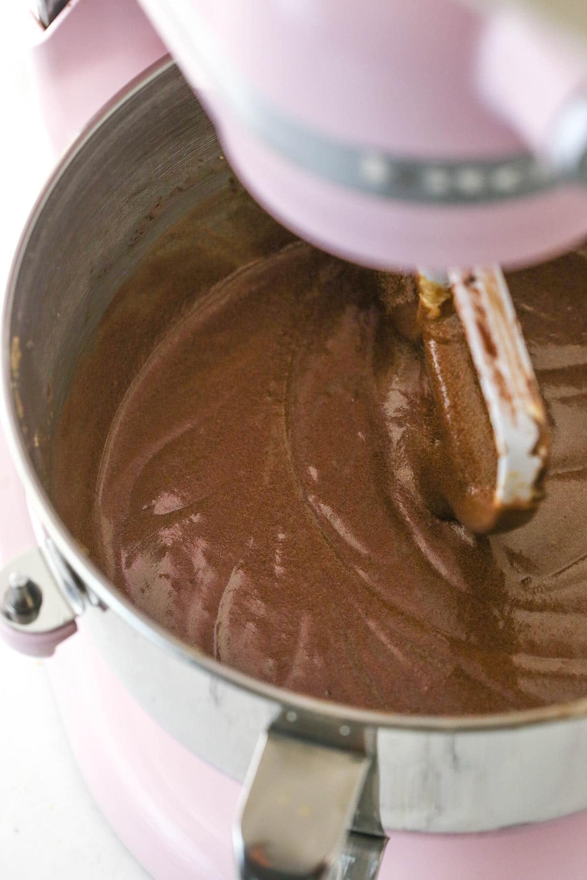final devils food cake batter in mixing bowl on stand mixer