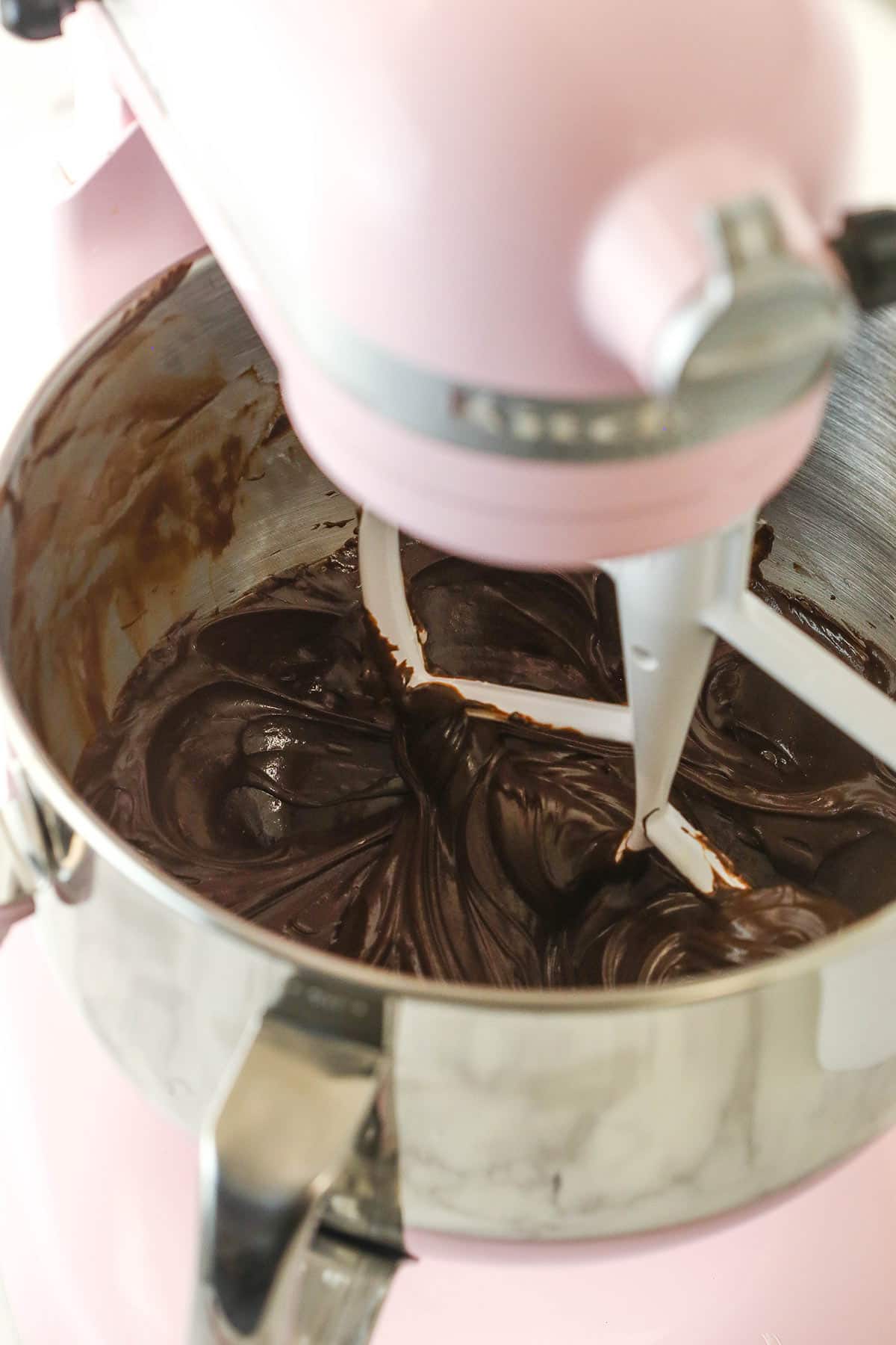 butter and melted chocolate combined in bowl of stand mixer