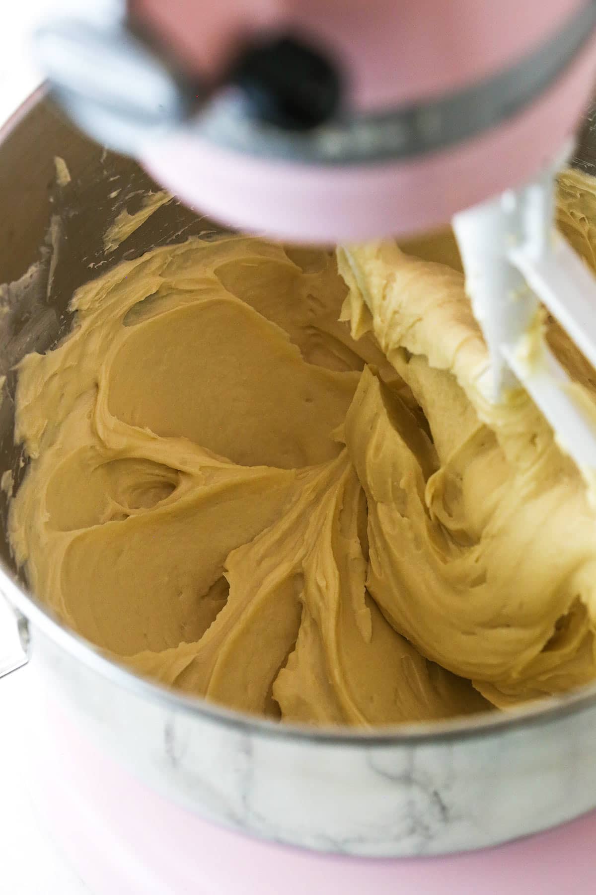 The combined cream cheese, sugar and flour in a big electric mixer bowl