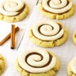 Copy cat Crumbl cookies on a wire rack lined with a sheet of parchment paper