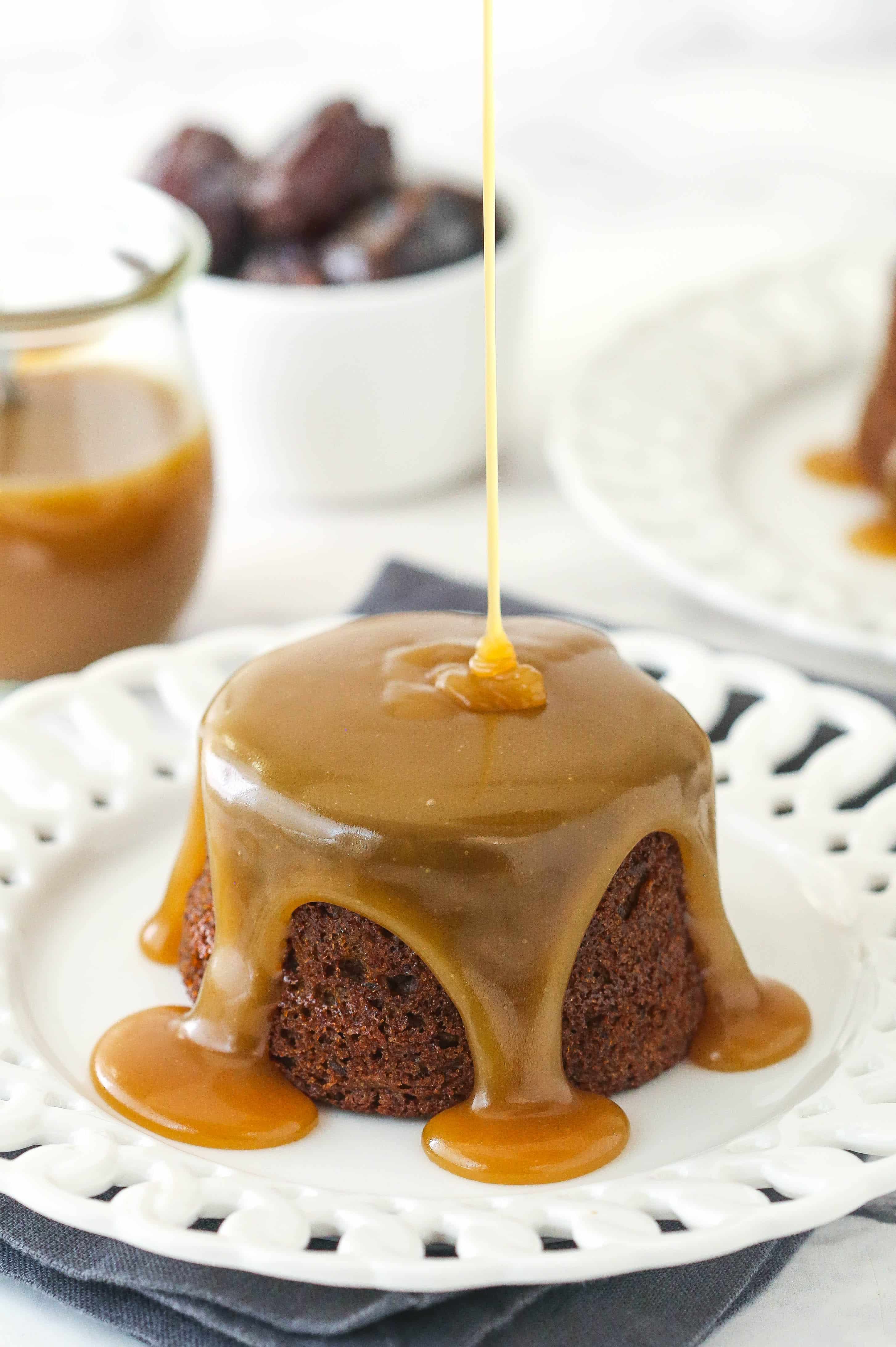 Drizzling toffee sauce over the cake