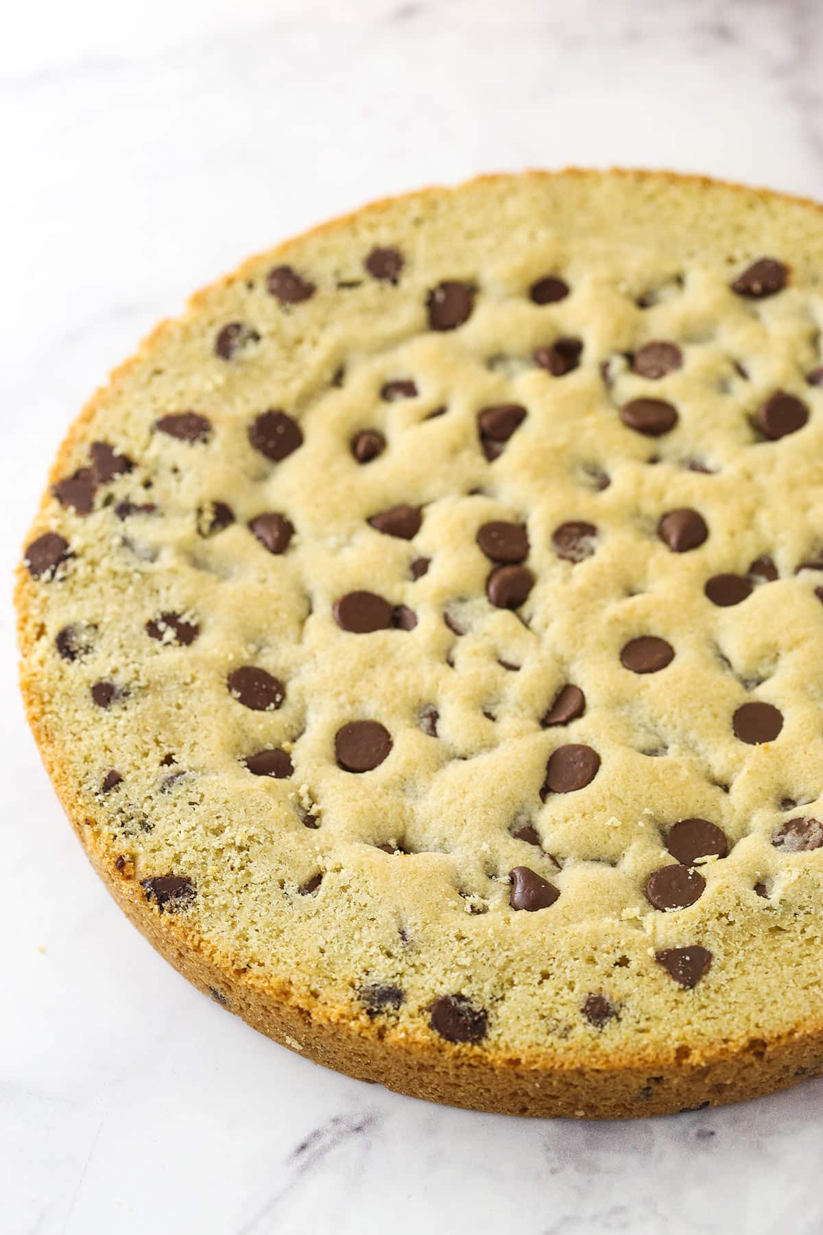 image of the chocolate chip cookie layer with the raised edges trimmed off