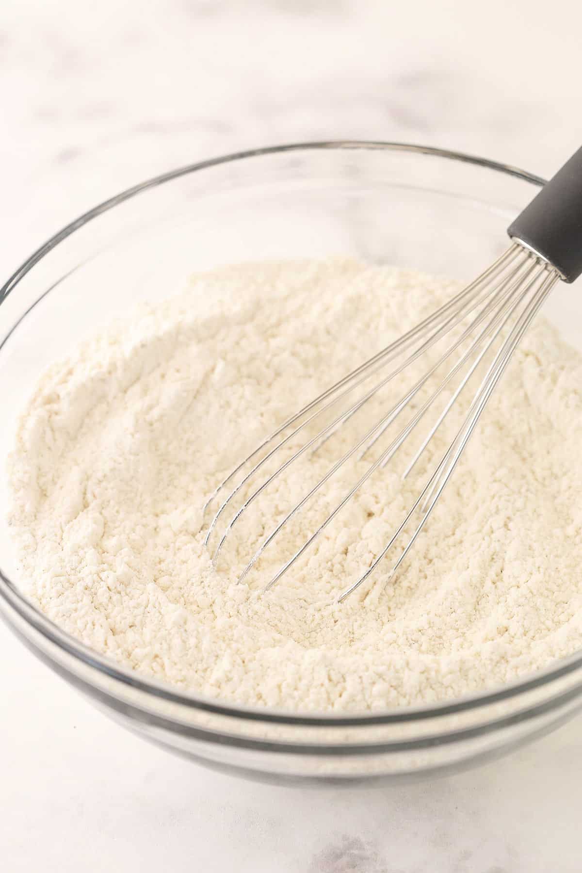 Mixing dry ingredients in a glass bowl