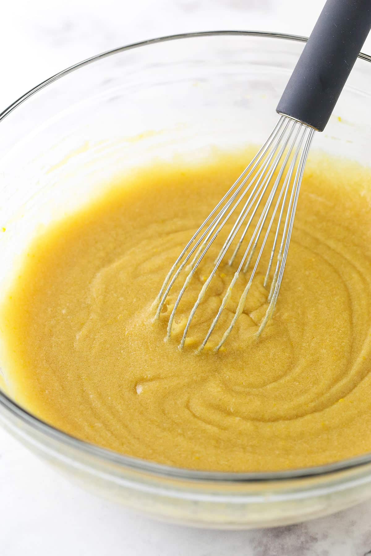 Wet ingredients combined in a glass bowl