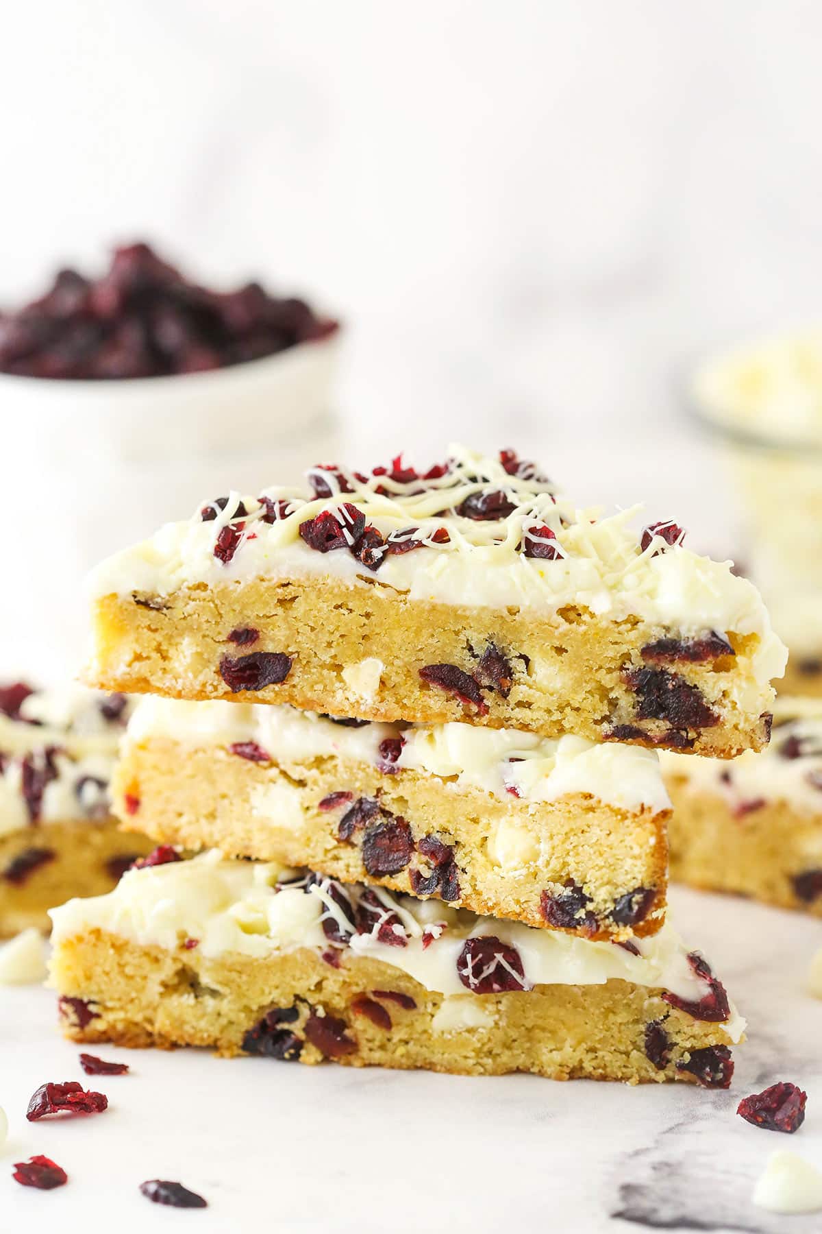 A stack of three cranberry bliss bars