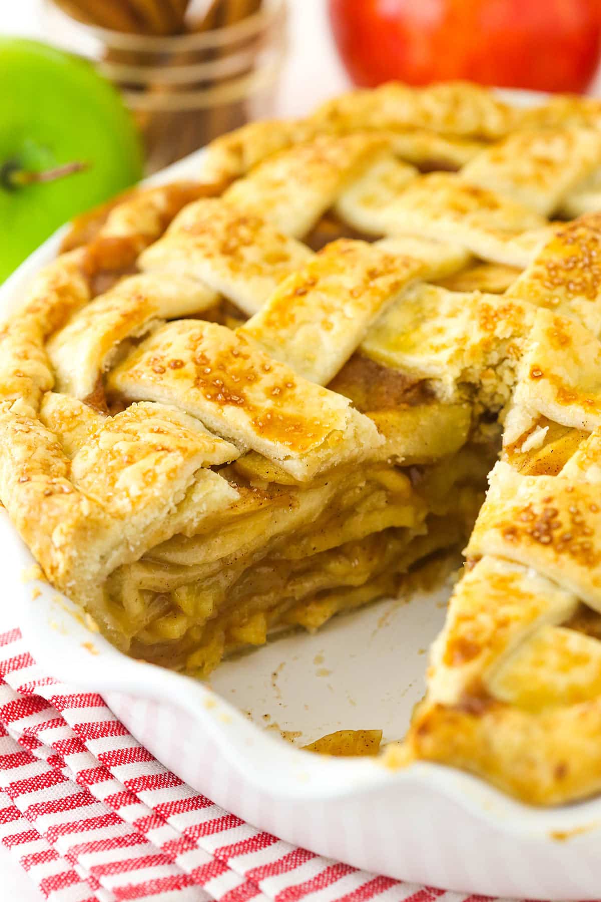 Apple pie with a slice missing.