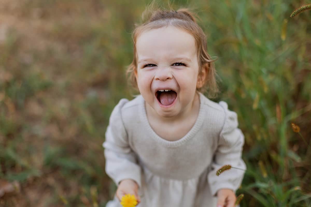 mckenzie smiling at the camera