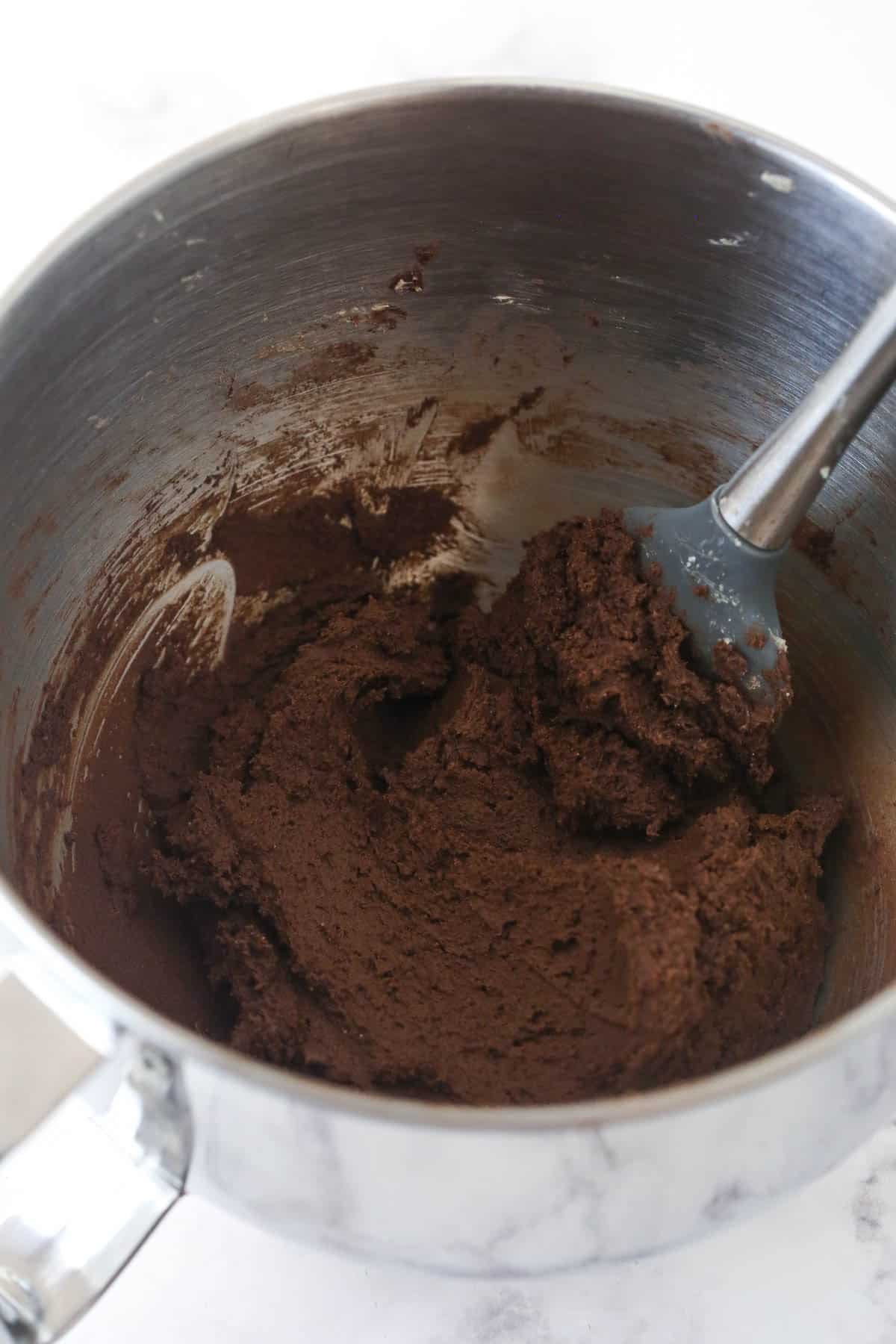 Adding the dry ingredients to the creamed butter and sugar