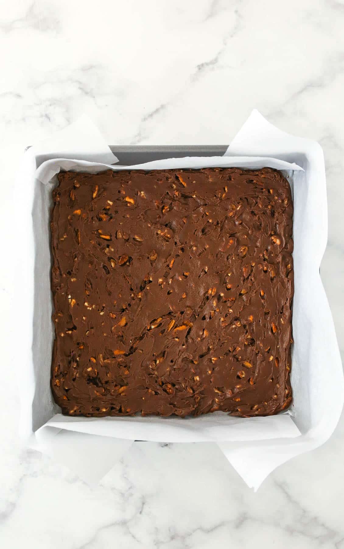 First layer of turtle fudge in the pan