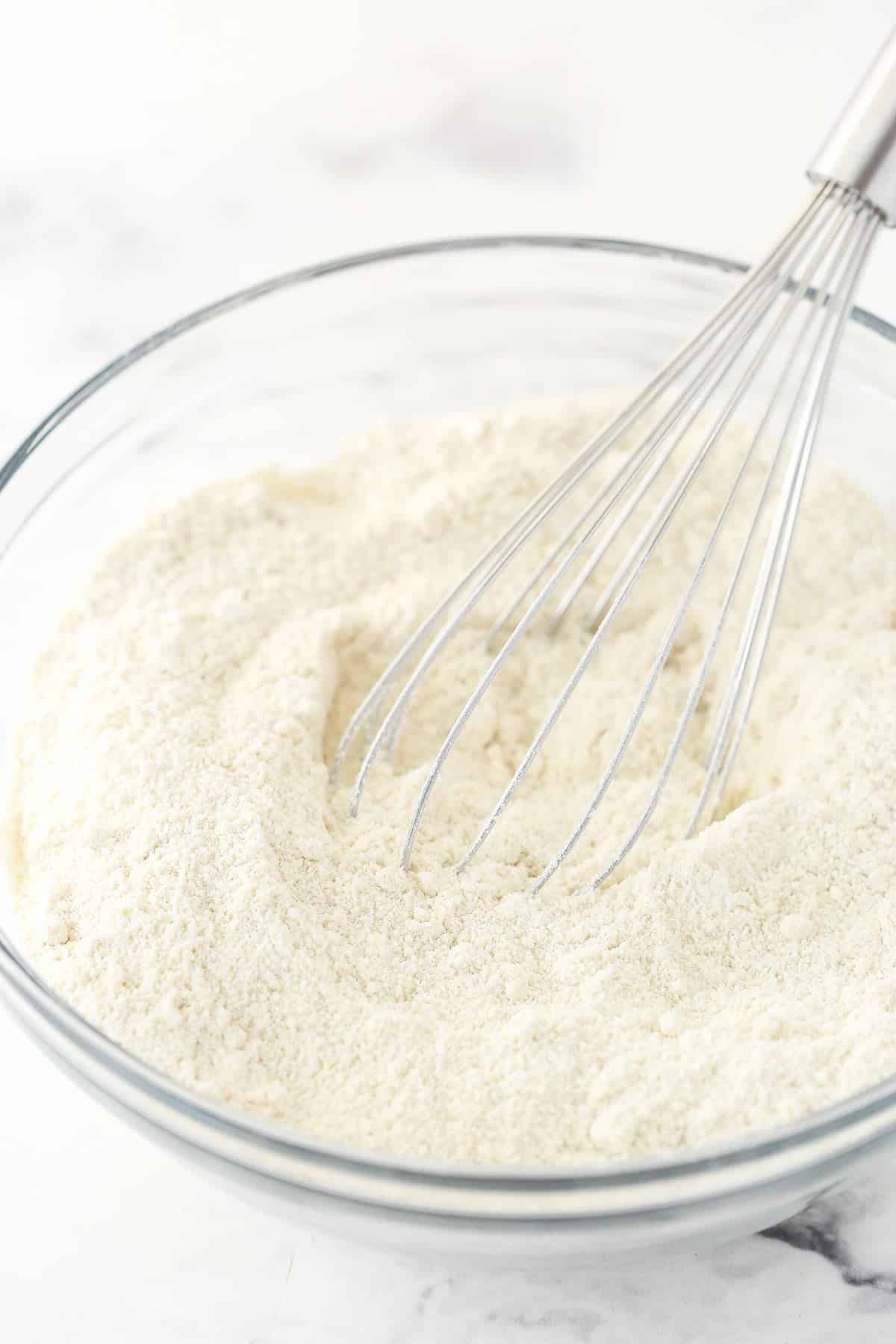 Whisking the flours and salt.