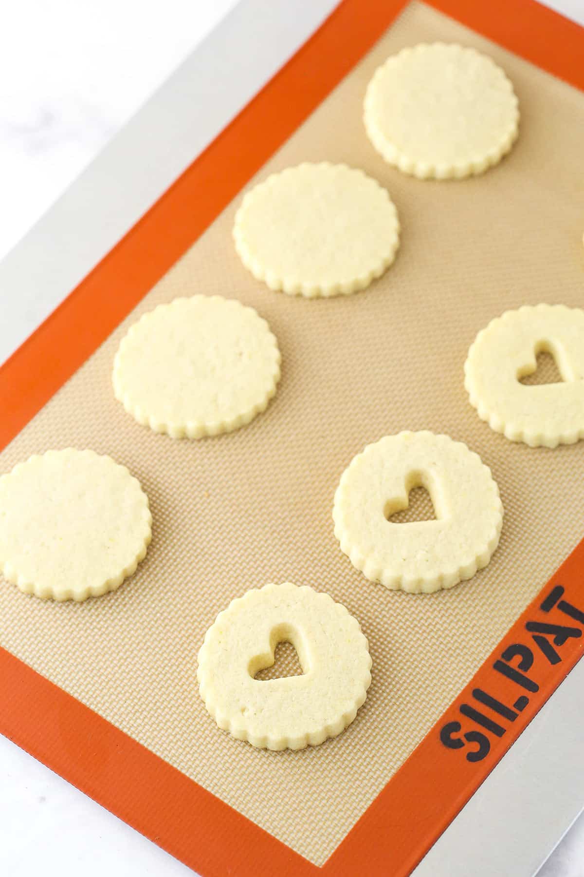 Baked linzer tart cookies without the filling.