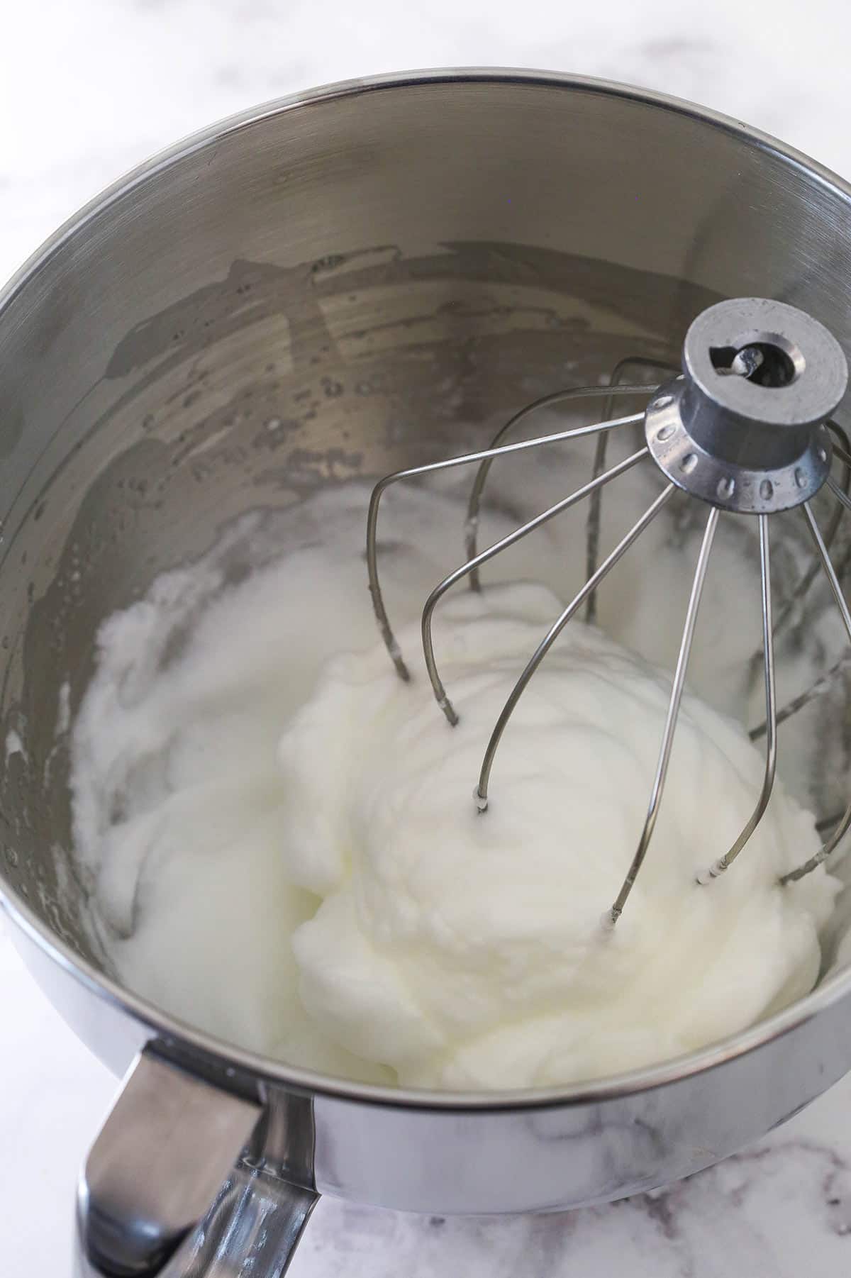 Whipping egg whites for conversation heart cupcakes.