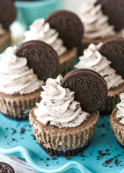 No bake mini Oreo cheesecakes on a serving platter.