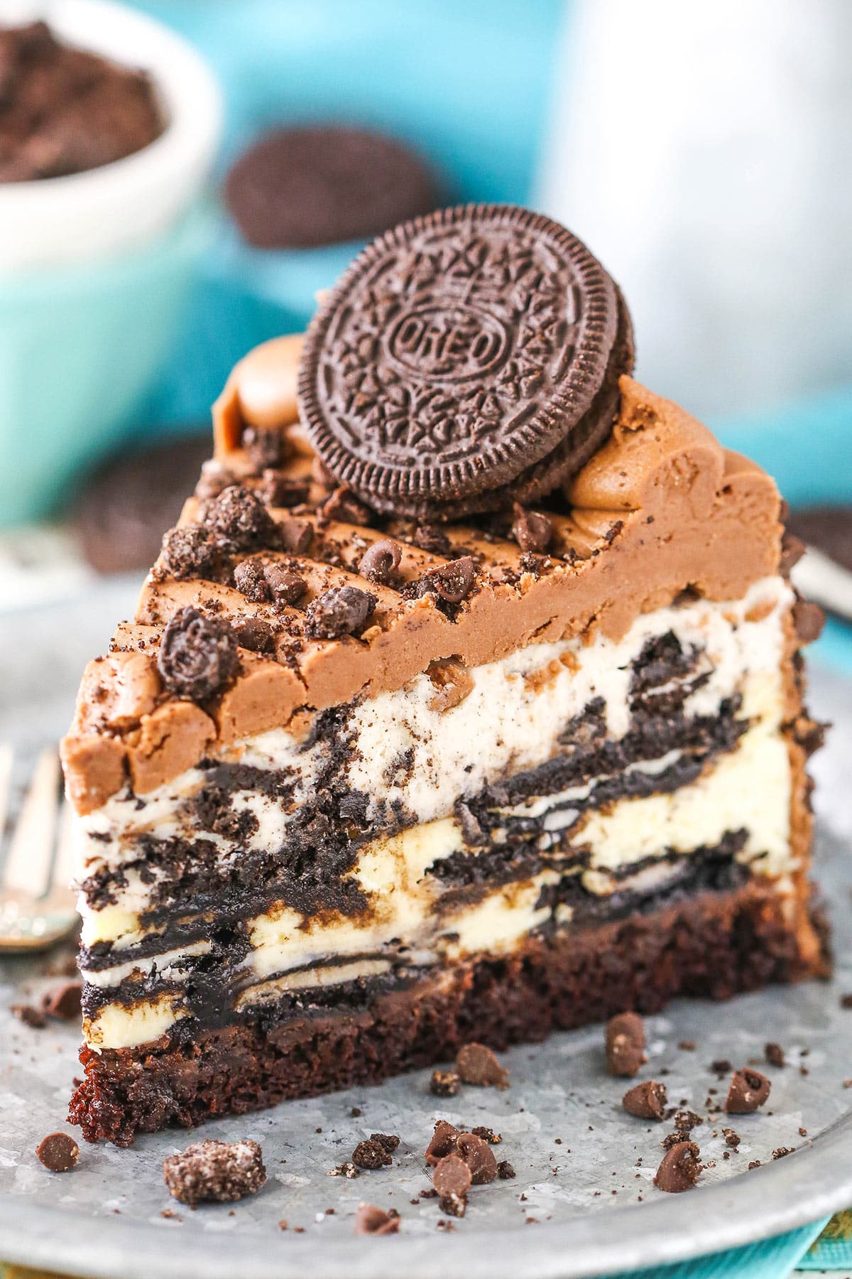 As slice of ultimate Oreo cheesecake on a plate.