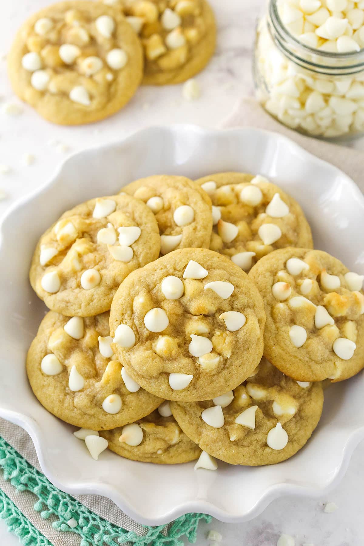 White chocolate chip cookies in a serving bowl.