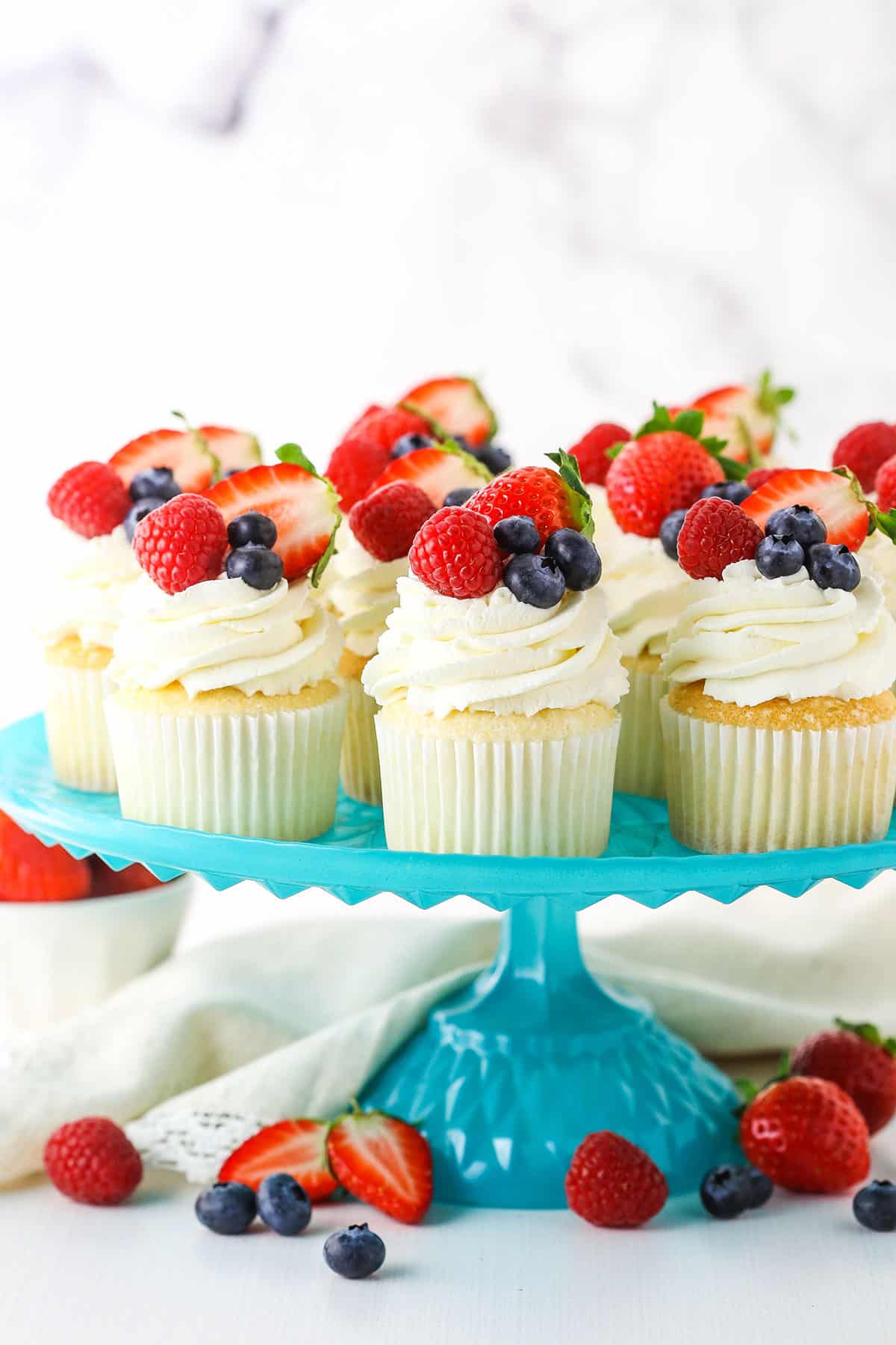 Fluffy Angel Food Cupcakes on a Cake Stand