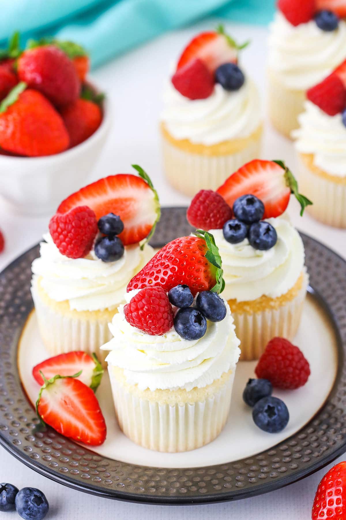 Three Fluffy Angel Food Cupcakes on a Plate