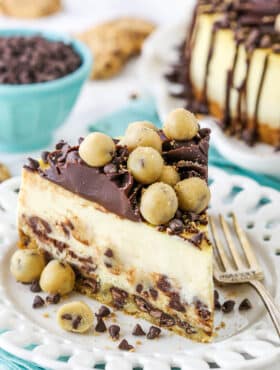 slice of chocolate chip cookie dough cheesecake on teal napkin