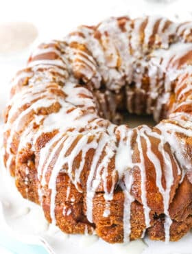 Top view of homemade monkey bread on a white plate